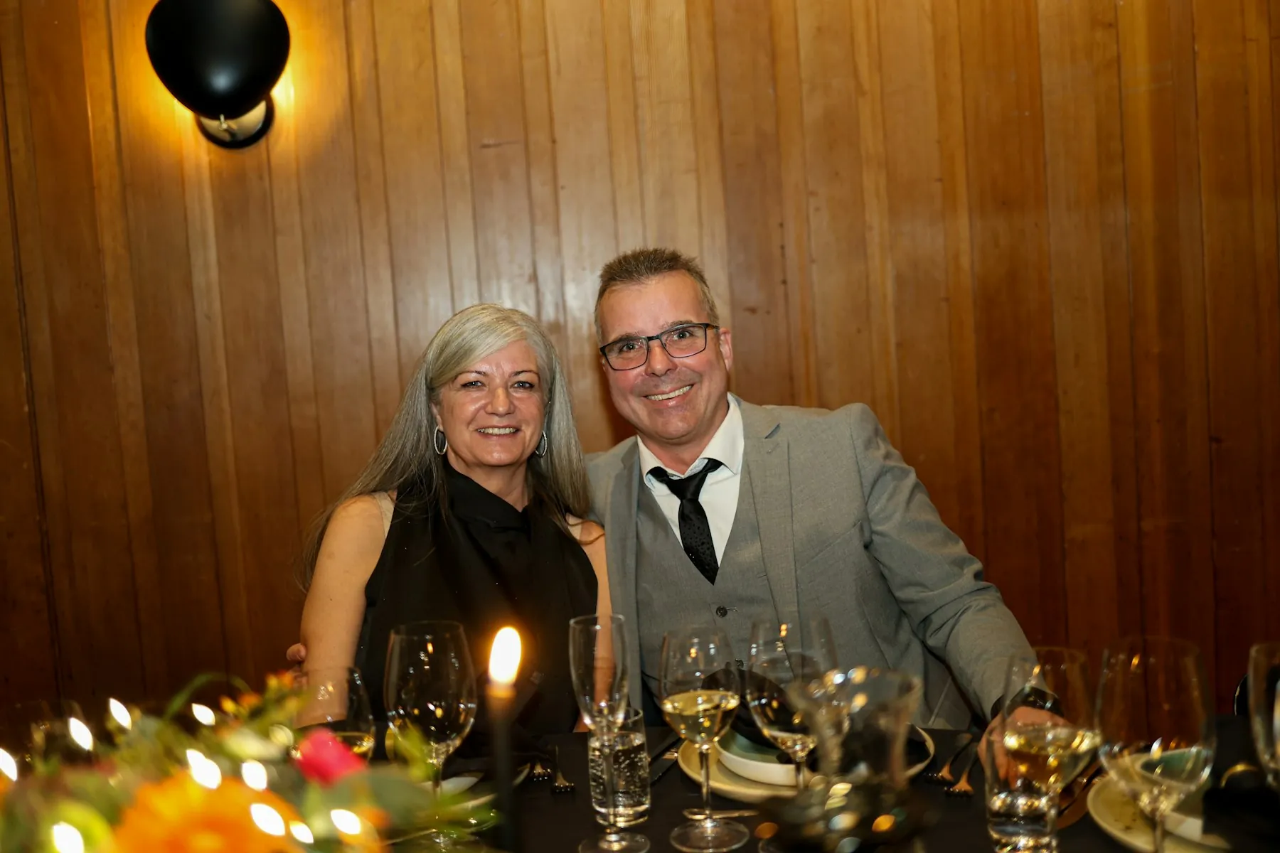 Guests around a fine dining table
